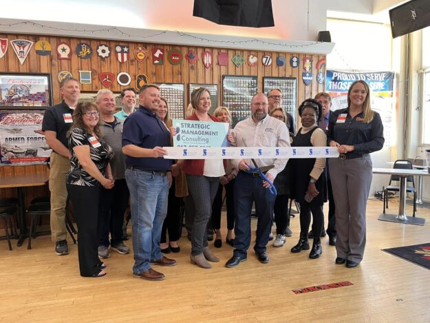 Jason Ribbon cutting